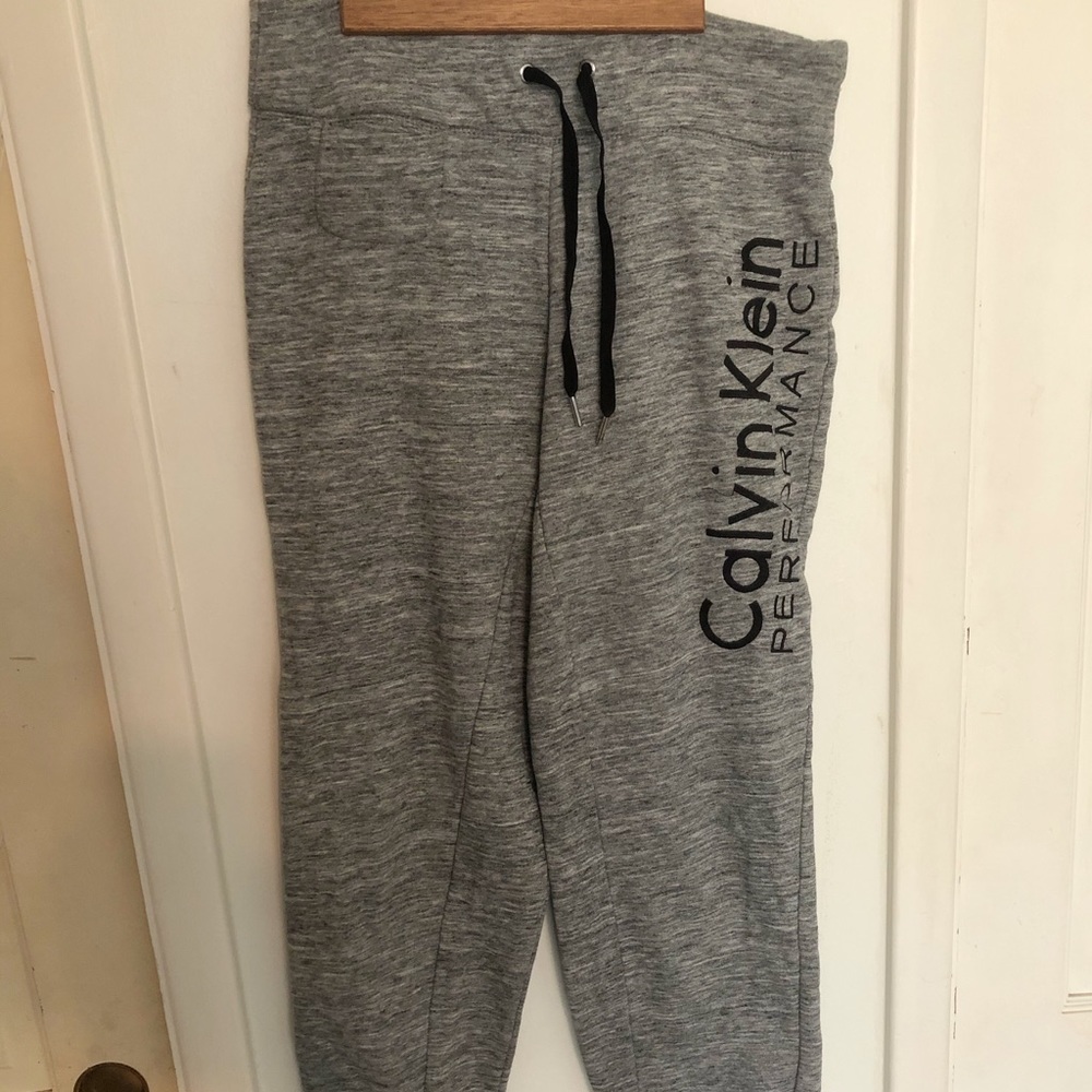 grey Calvin Klein sweat pants